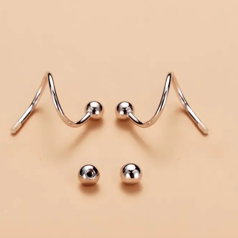 GEOMETRIC TWIST EARRINGS Stainless steel STATEMENT PIECE - Picture 4 of 4